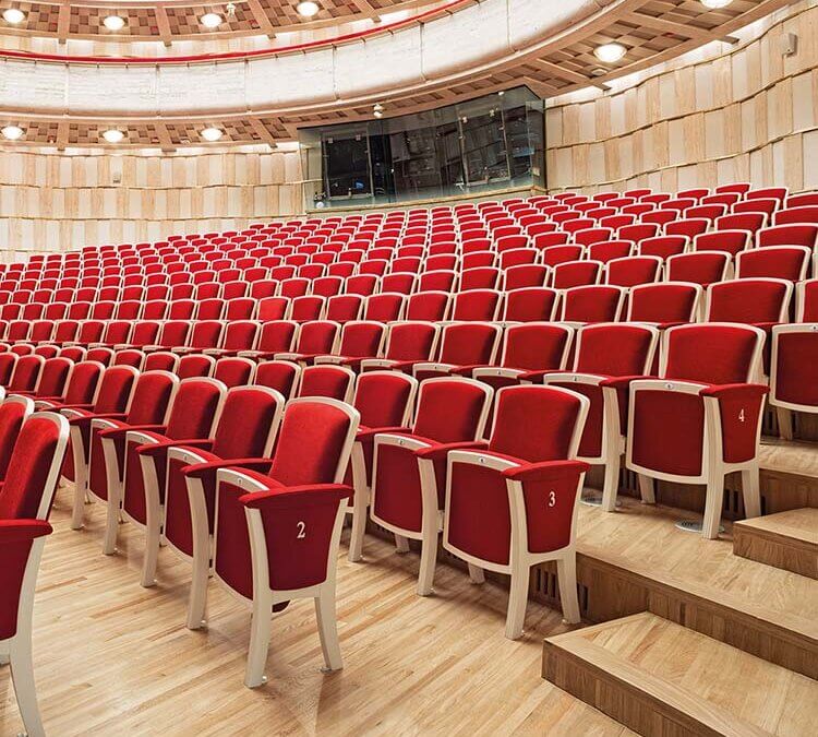 The design of curved plywood seats for arenas and large classrooms: customized solutions for every need